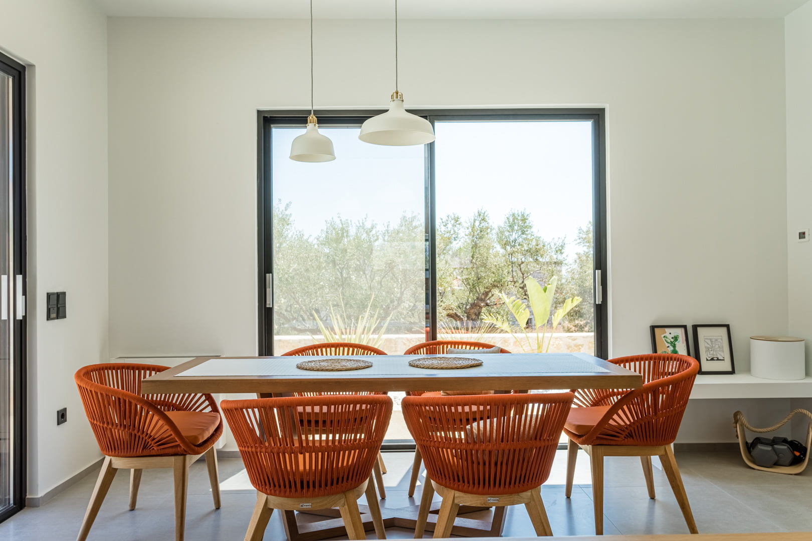 dinning table with orange chairs